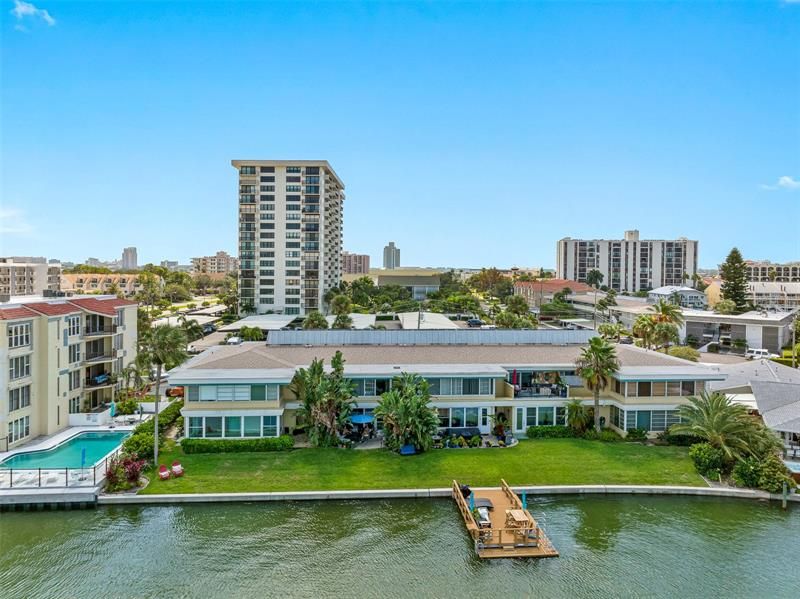 Arial rear view of 270 Skiff Point backyard/dock on beautiful, sunny, Island Estates in Clearwater Beach, Florida