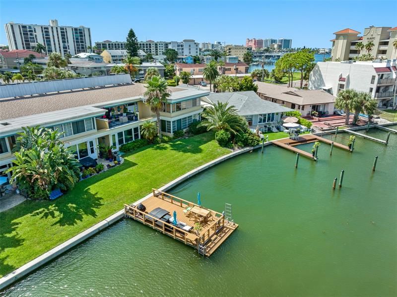 Arial shot of dock on beautiful, sunny, Island Estates in Clearwater Beach, Florida