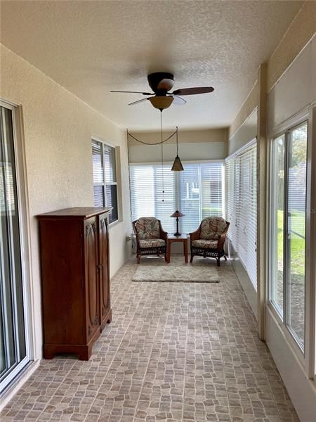 Florida room with tile flooring