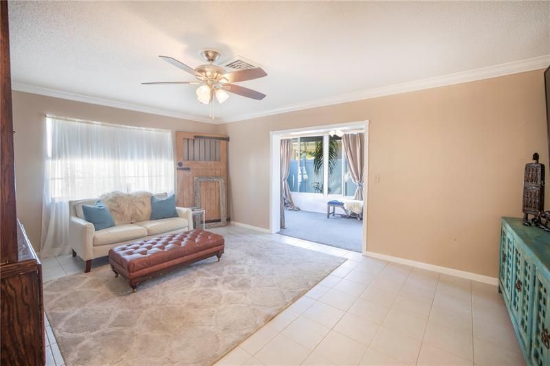 Living room is the heart of the home and opens to the dining area and Florida room!