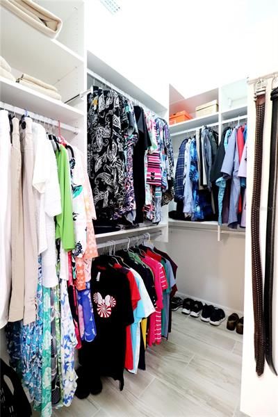 walk-in closet with a California closet system