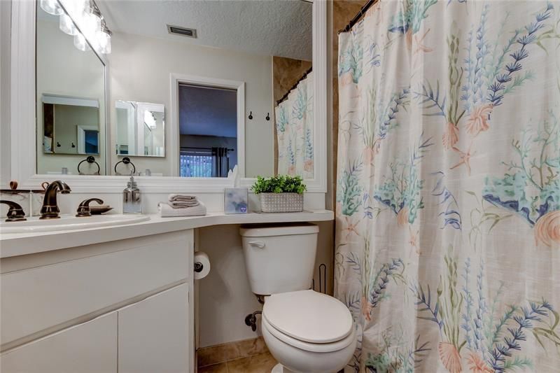 owners retreat full bathroom w pocket door access and BIG mirrors