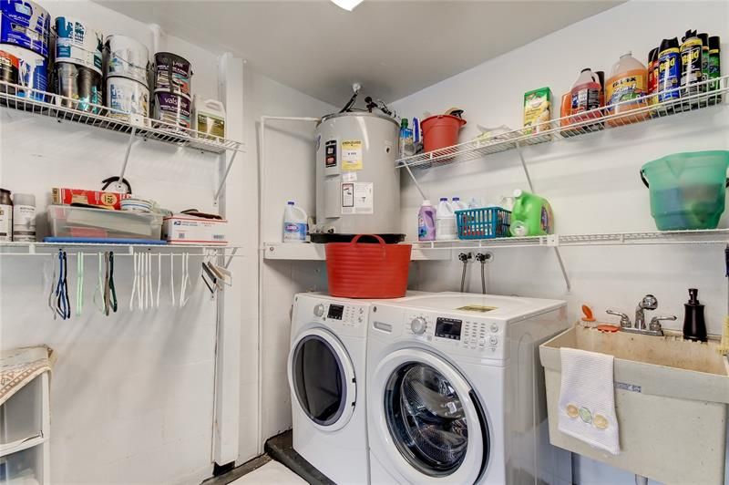 Fully stocked laundry are (detergent, fabric softner, dryer sheets, mesh bags for delicates) in garage