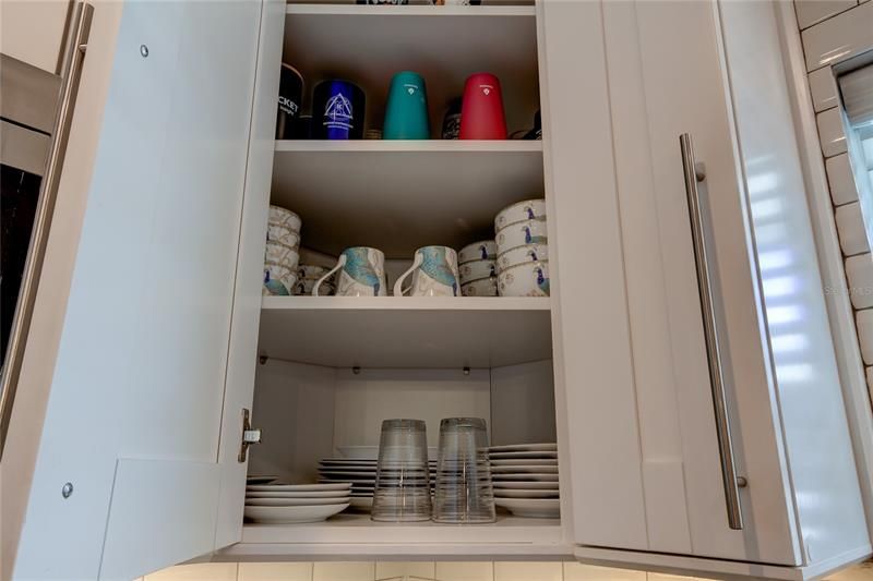 Stocked Dishware for real meals 42-in upper cabinets with a step stool for convivence