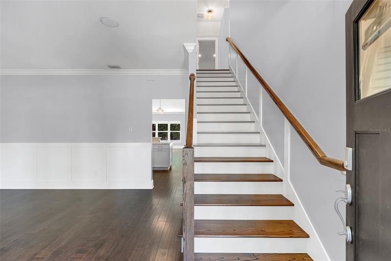 Foyer with wood staircase