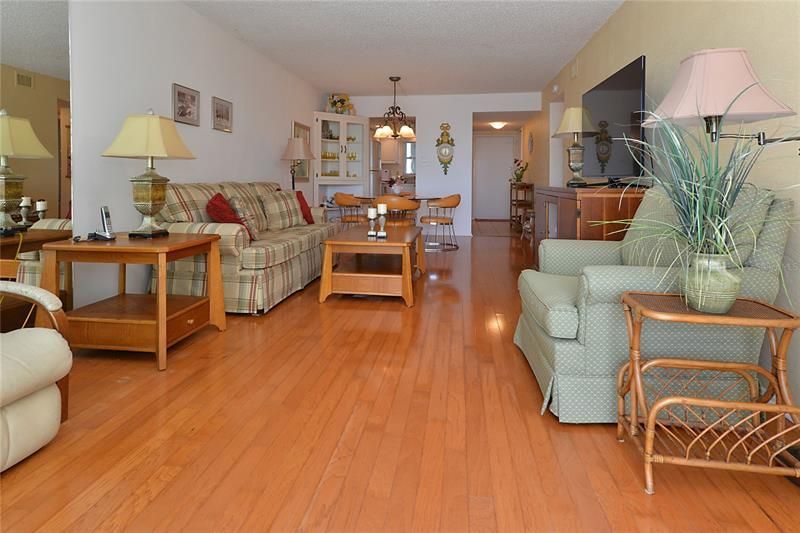 Here you get a great picture of how the Pecan Hardwood floors go all the way to the entry way.