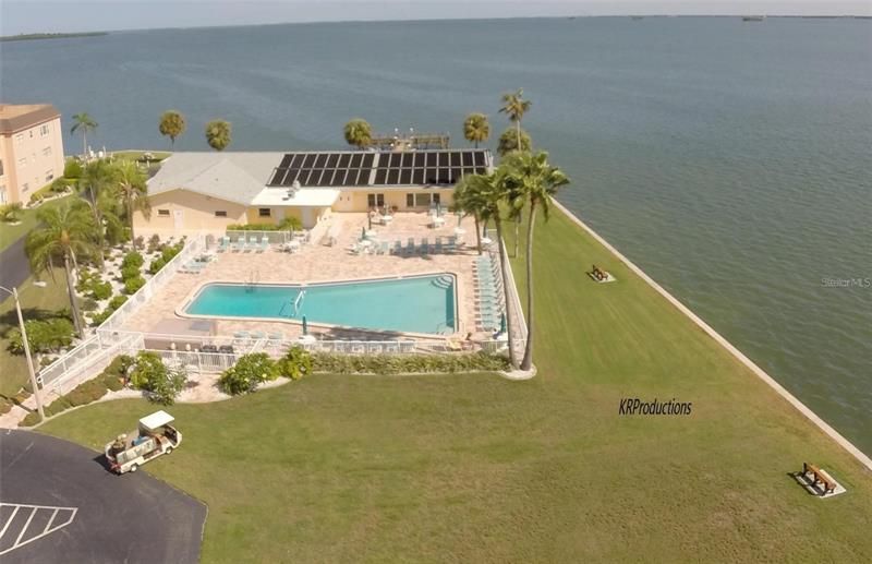 The almost Olympic size heated pool and clubhouse overlooking St. Joseph's Sound. Luxury at its best.