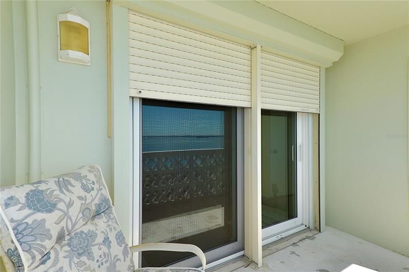 Hurricane storm doors with the extra protection of Hurricane roll down shutters.