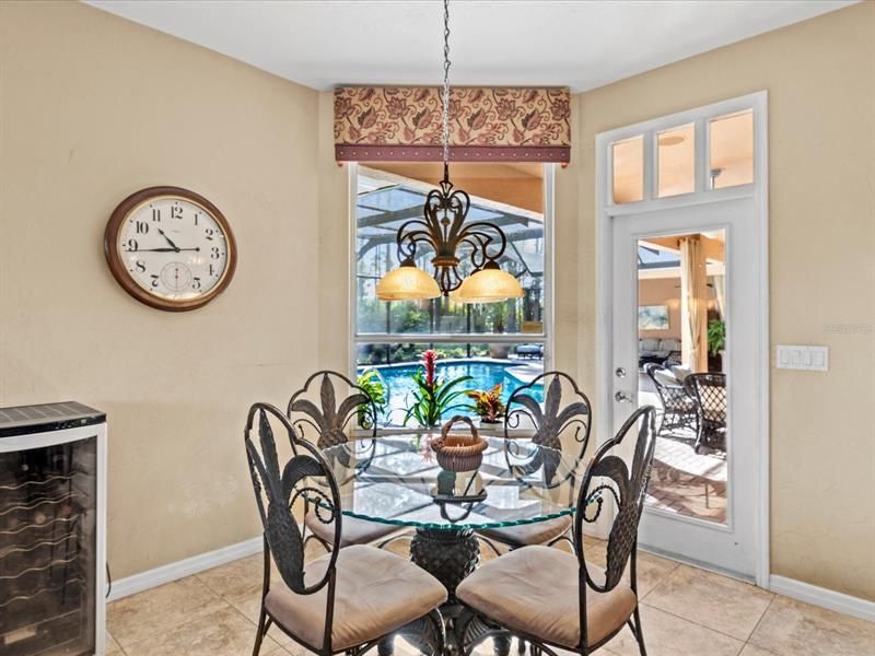 Eat in Kitchen/Breakfast Nook Area w/ Direct Access Out to the Pool Area