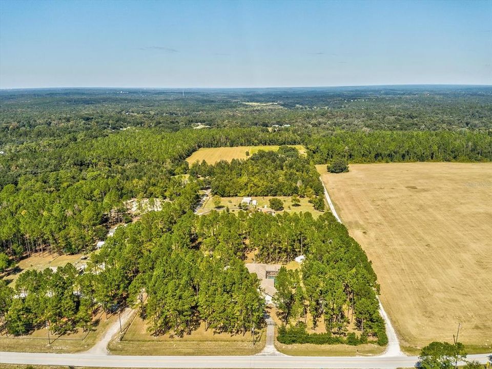 Another Drone Aerial View of the Property and Surrounding Area Looking North