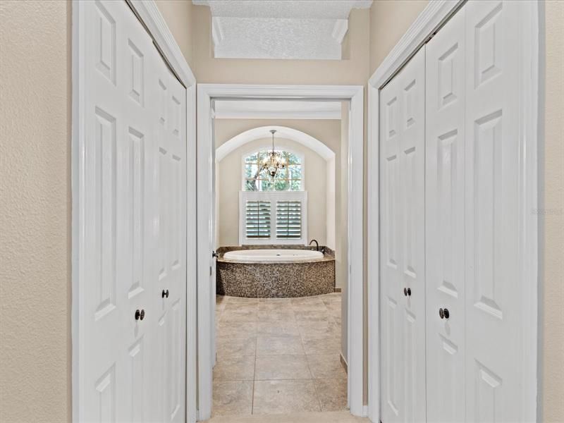 View Looking into the Master Bath w/ (2) Walkin Closets on Either Side