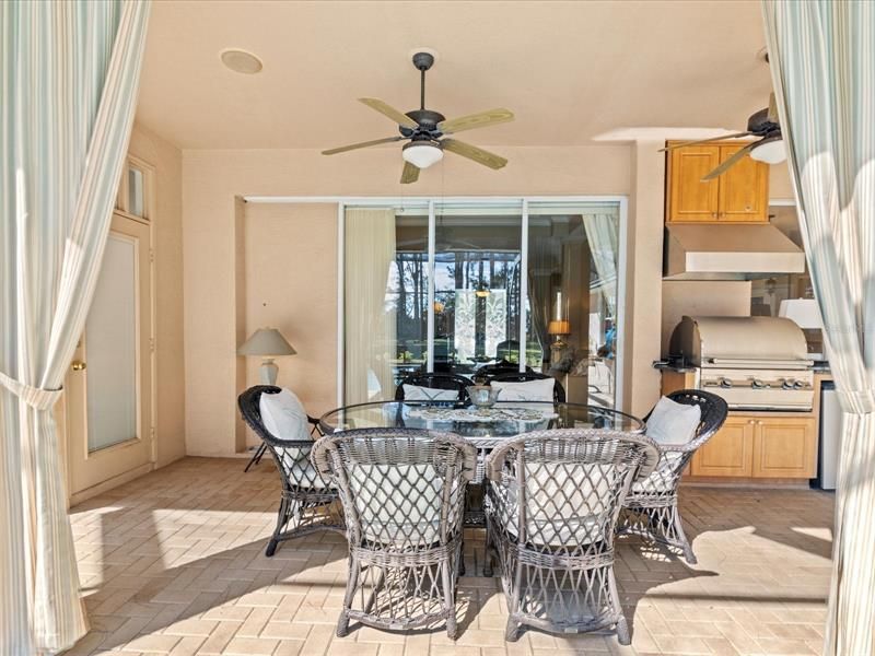 Outdoor Dining Area with Pocketing Sliding Glass Doors to the Living Room