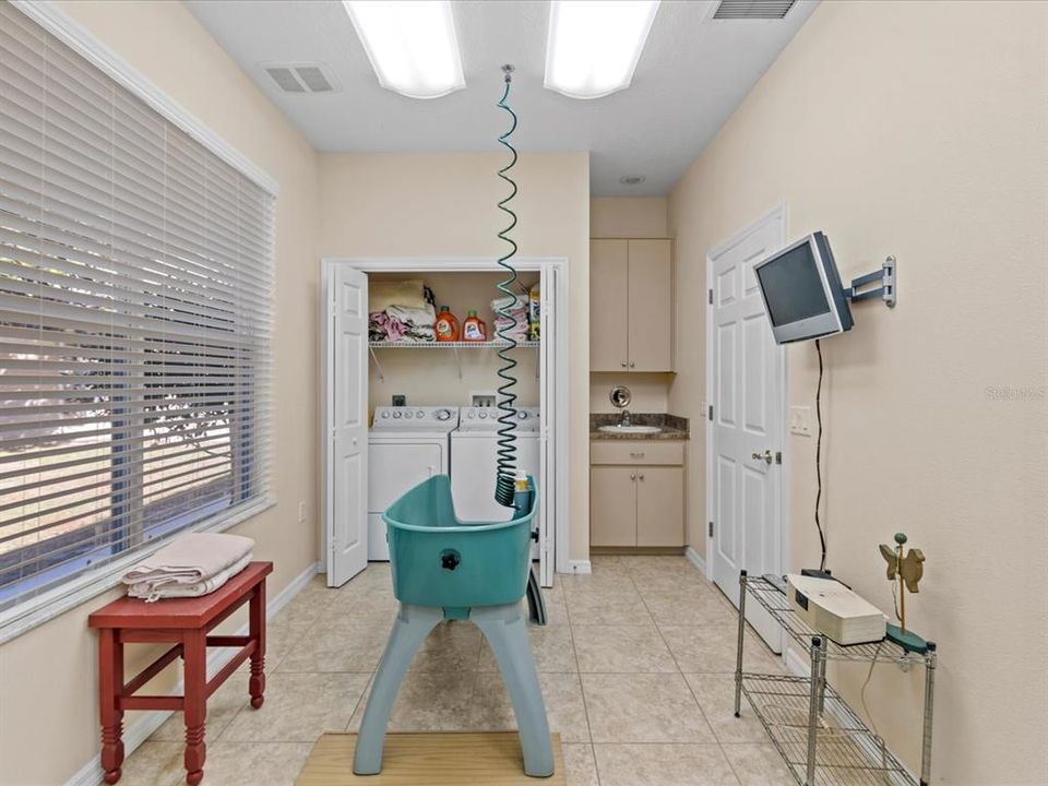 Another View Showing the Washer & Dryer Closet & Sink Vanity w/ Base Cabinet & 42" Upper Cabinet