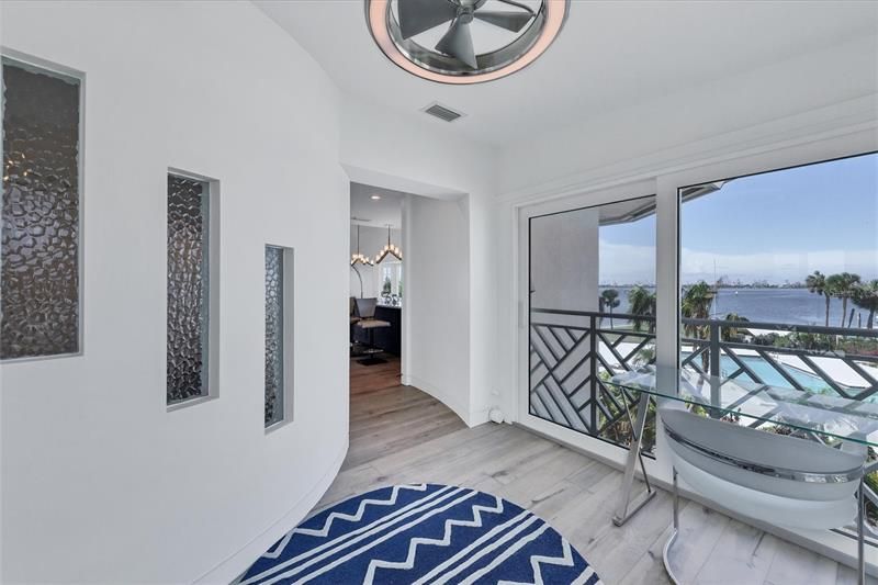 Capture water views from the moment you enter this fully renovated residence