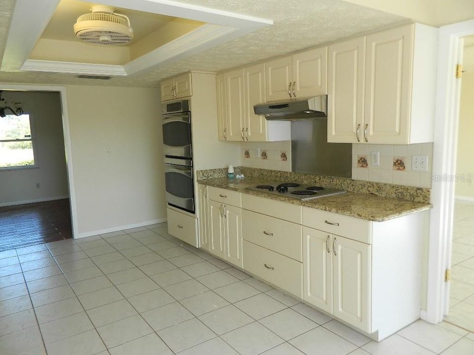 view of Kitchen with double oven and cooktop