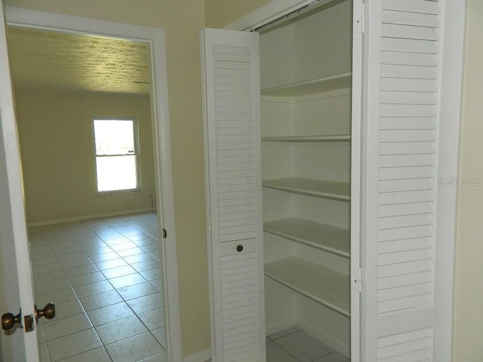 Storage closet in laundry room