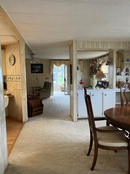 Hallway looking into the Kitchen area, Dining Area on the right and into Living Room