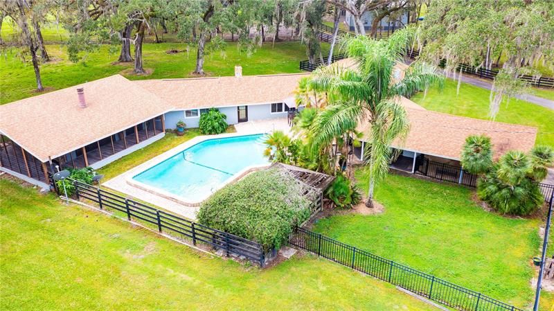 Ariel of home with carport and pool