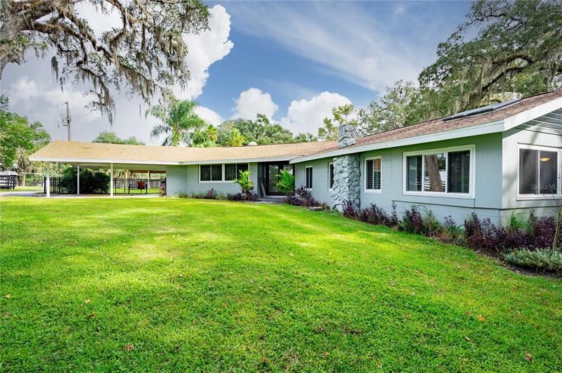 Front of home with carport