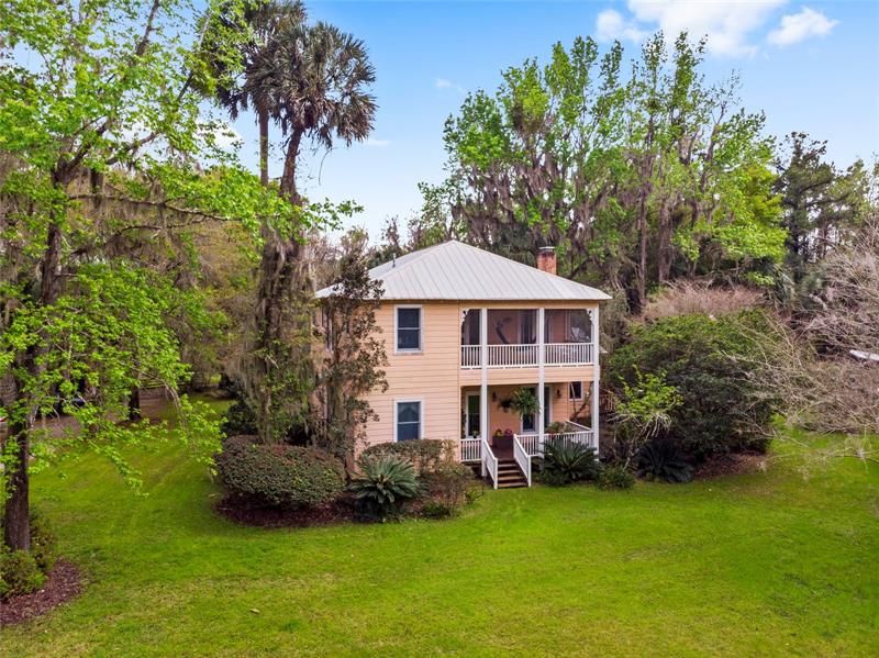CASA MICANOPY - A STUNNING 5.47 ACRE OASIS WITH TWO FULL SIZE HOMES REMINISCENT OF OLD FLORIDA