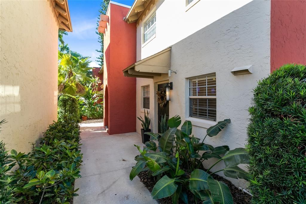 Courtyard to front door from parking lot