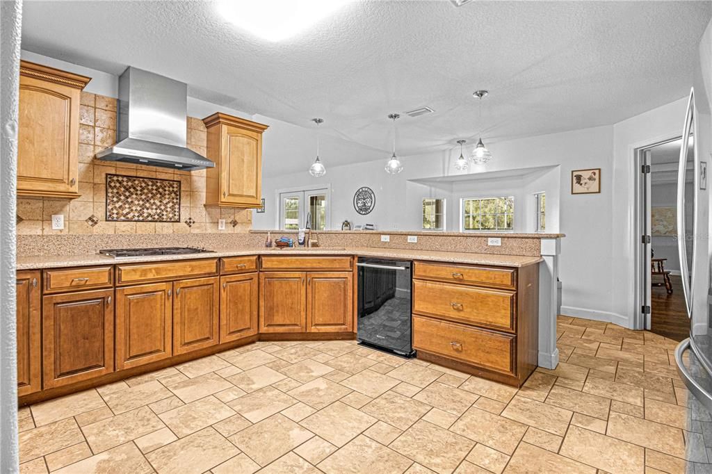 Kitchen view with wolf gas range top