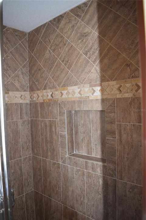 Guest Bath Tile in tub enclosure