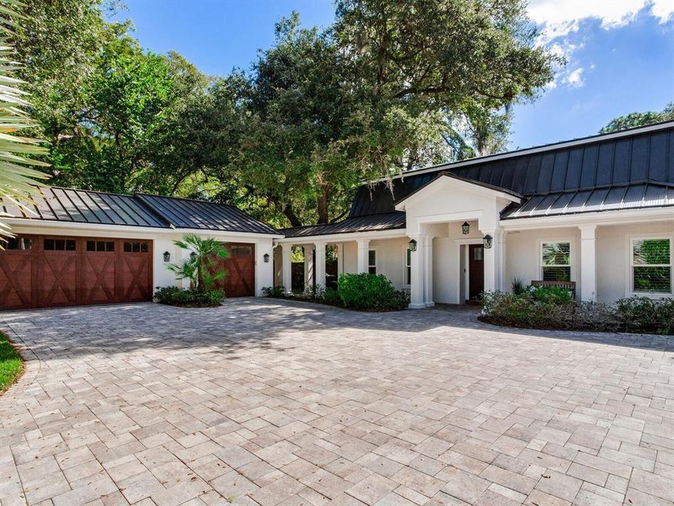 Front entrance with 3 car garage