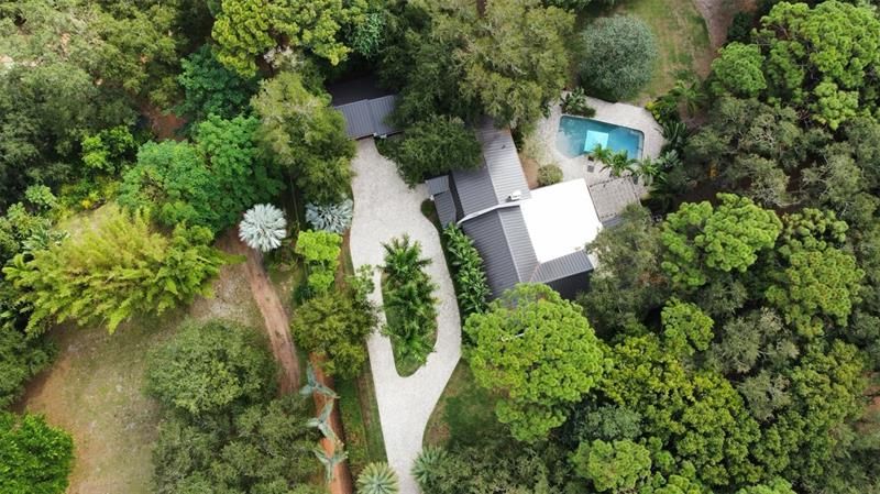 Aerial view of home situated on over a 2 acre estate lot