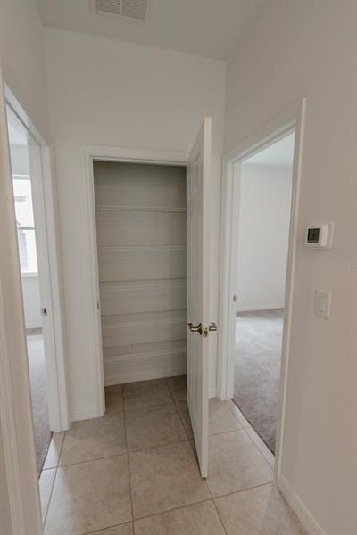 Linen Closet (interior photos from model home which has same finishings as this house)