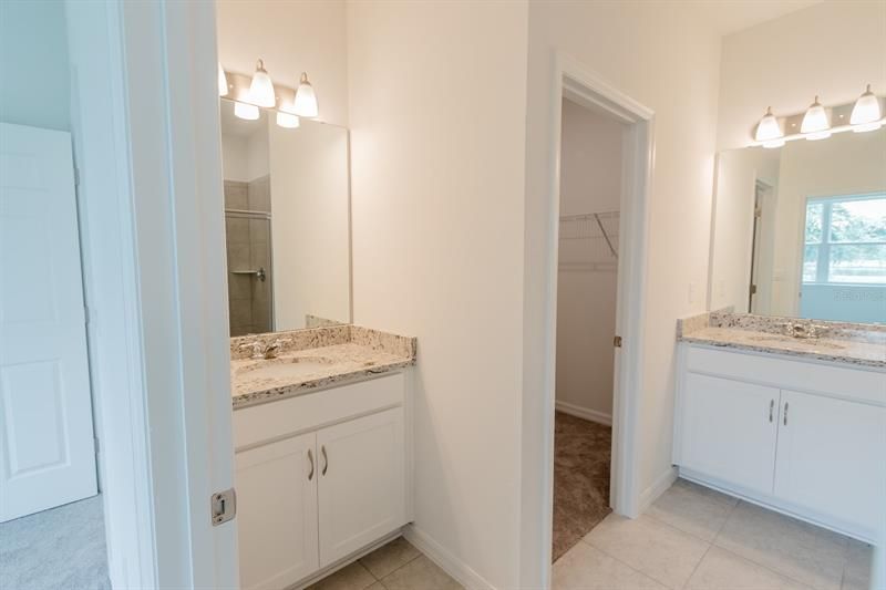 Master Bathroom with Dual Sinks (interior photos from model home which has same finishings as this house)