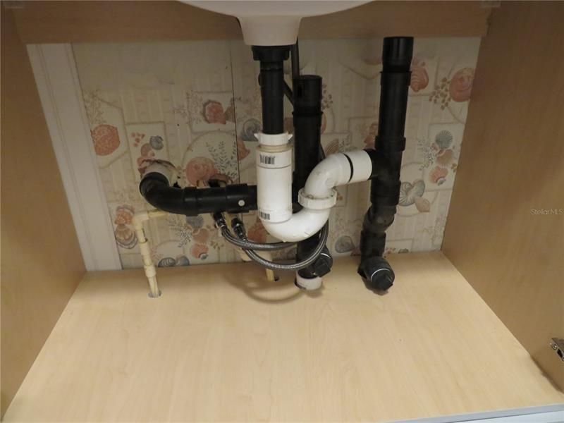 under guest bathroom sink