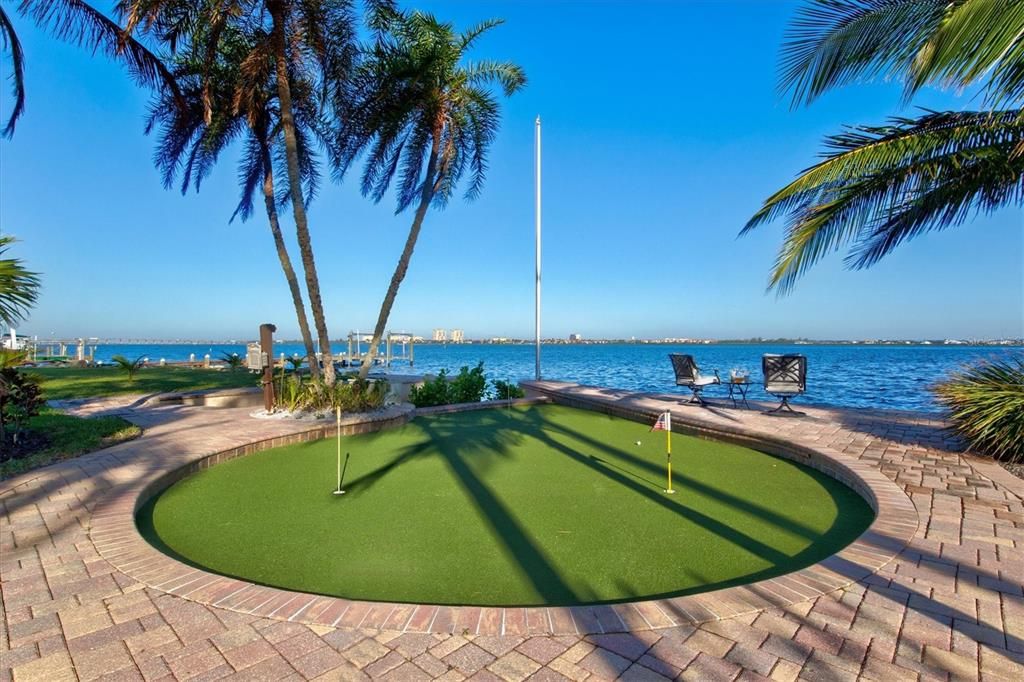 Putting green at waters edge.