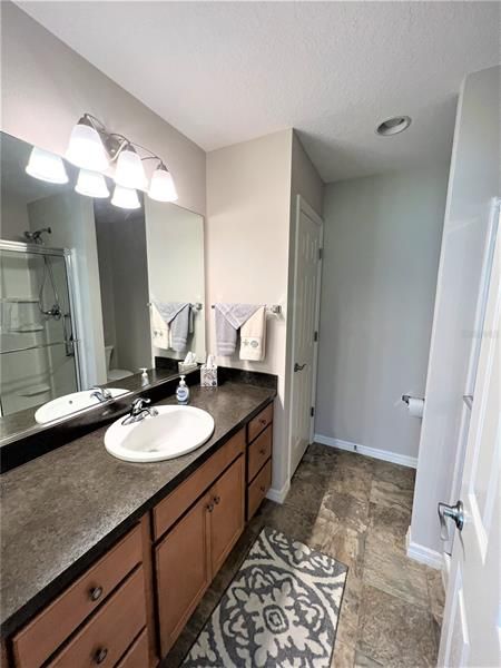 Your Roomy master bath with walk in shower