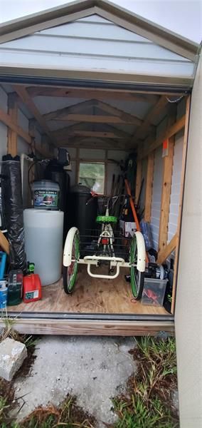 Storage shed and water softener