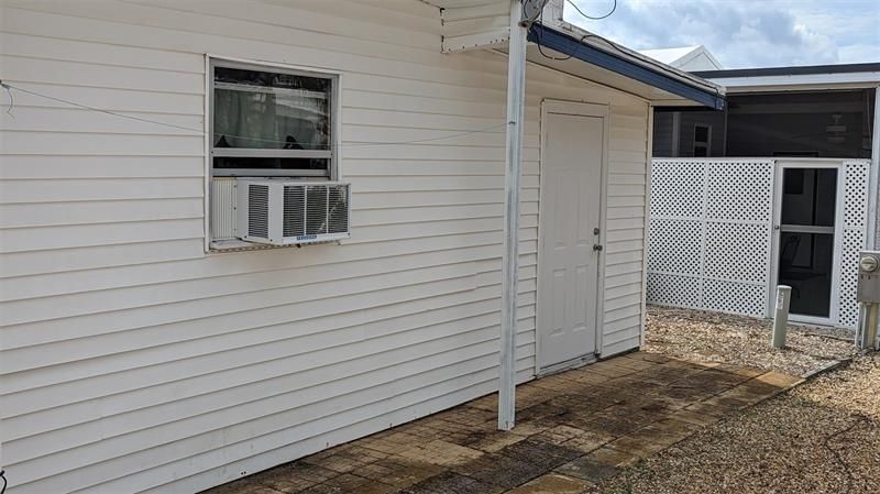 REAR OF HOUSE, AC IN SHED