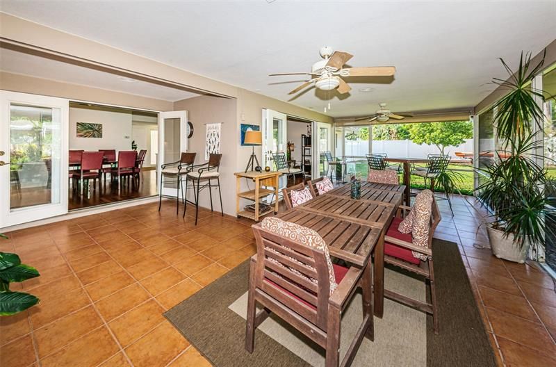 Dining room flows into lanai for entertaining.