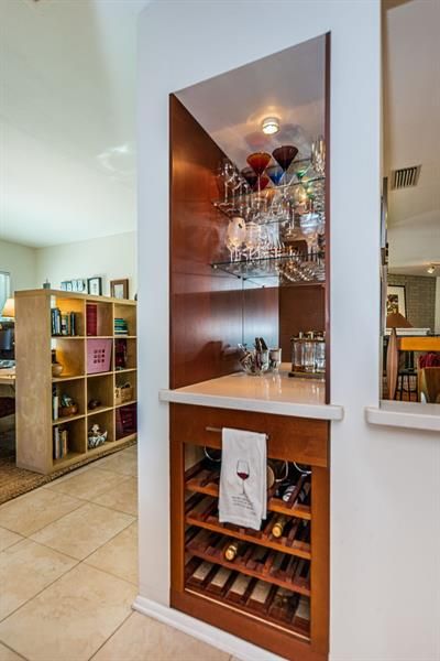 Built in dry bar and wine rack.