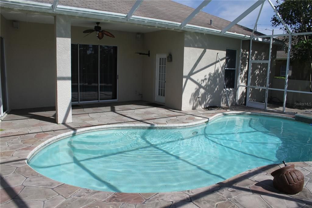 Large covered area by oversized pool or plenty of sun.  Maintenance of pool included.