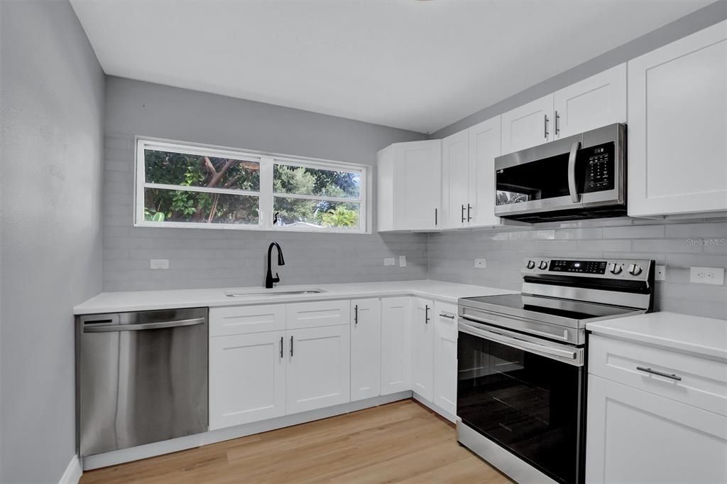 Kitchen- new cabinets, countertops, backsplash & appliances