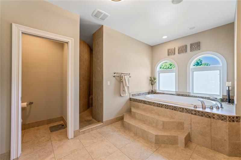 Primary Bathroom with Soaker Tub and Private Shower