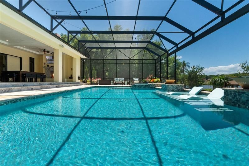 The finest feature of the pool is the large screened north side without brackets.  You are gifted with a grand panoramic view of the lake and the sky beyond.
