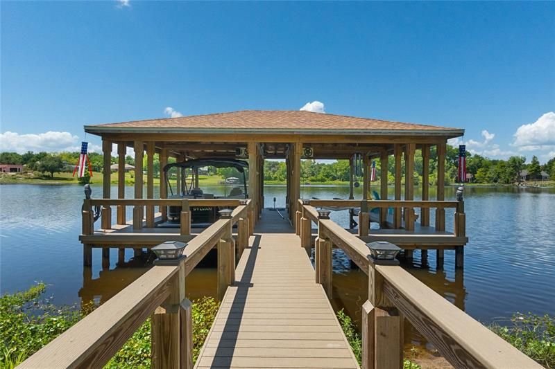 The boat dock has two slip spaces, electricity and water.