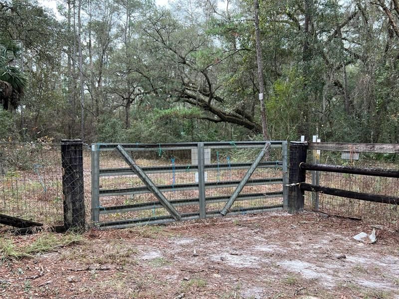 Gate access to the trails from the back of the property.