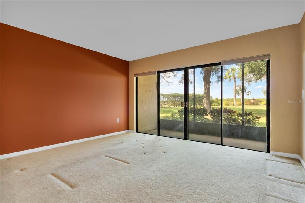 Living Room features Large Glass Sliding Doors