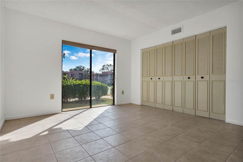 Bedroom #2 features Glass Sliding Doors