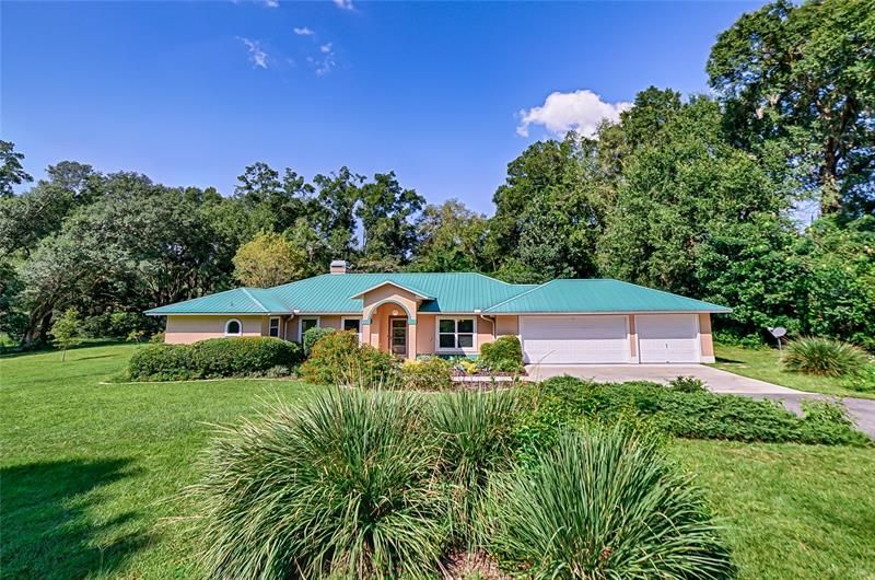 Gorgeous home on 6 gated acres!