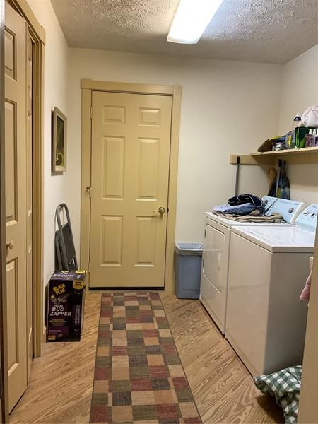Inside Laundry room and large pantry storage