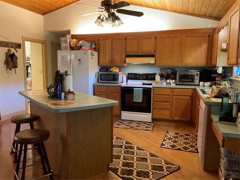 Kitchen -Island workstation and Oak Cabinets