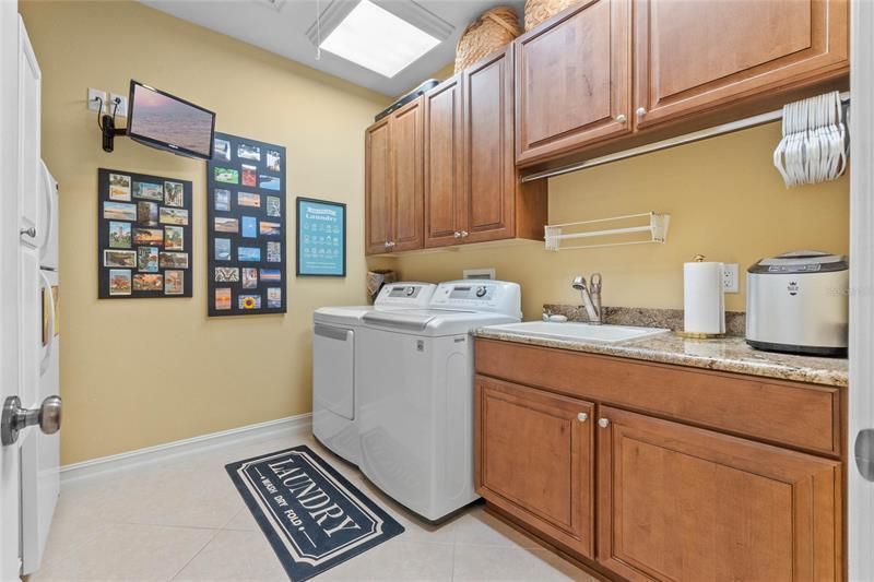 Laundry room as a second refrigerator and plenty of storage